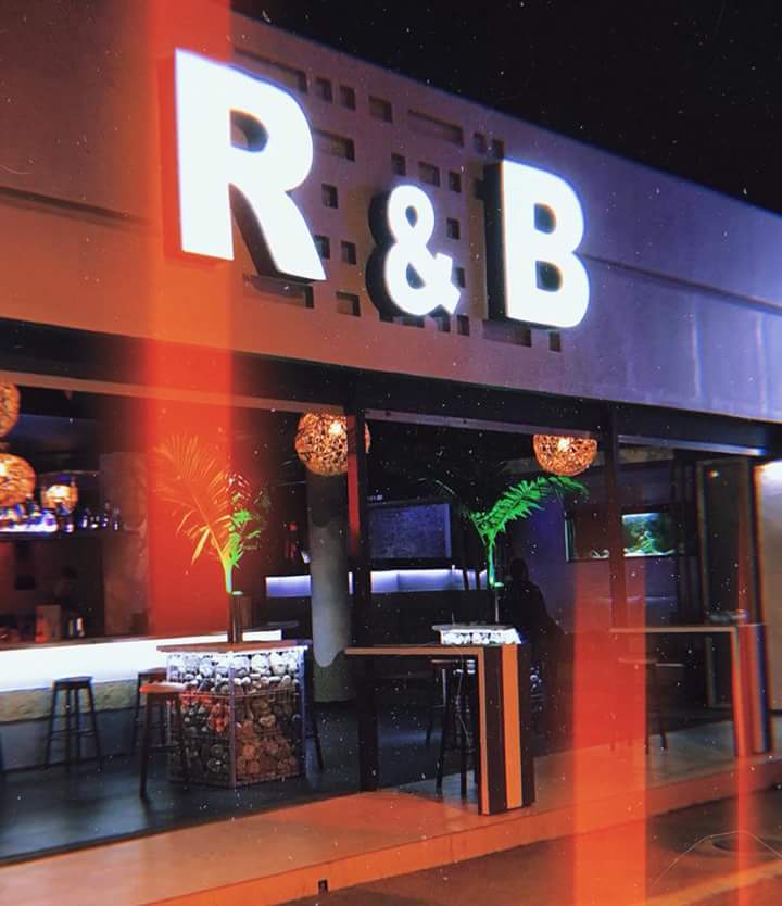 The R&B Plus facade at night